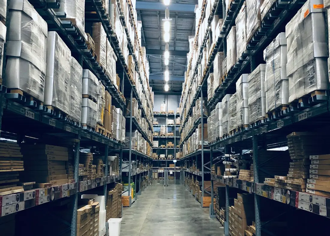 Warehouse aisle with goods on pallets